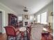 Bright living room with a fireplace, hardwood floors, and a classic, cozy feel at 907 Edgewood Cir, Gastonia, NC 28052