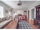 Inviting living room featuring hardwood floors, a ceiling fan, and a traditional decor at 907 Edgewood Cir, Gastonia, NC 28052