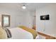 Bright bedroom features hardwood floors, a large window, and a ceiling fan at 9217 Tenby Ln, Matthews, NC 28104