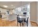 The dining room overlooks the living room and kitchen, creating a shared living space at 9217 Tenby Ln, Matthews, NC 28104