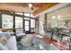 Screened porch with outdoor furniture, table and chairs, and view of the backyard at 9217 Tenby Ln, Matthews, NC 28104