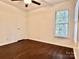 Bedroom with a ceiling fan and view from the window at 9907 Furlong Trl, Charlotte, NC 28269