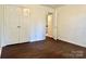 Bedroom featuring a closet and adjacent bathroom entrance at 9907 Furlong Trl, Charlotte, NC 28269