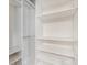Spacious closet with built-in shelving and ample storage space at 100 N Laurel Ave # 107, Charlotte, NC 28207