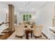 Cozy living room featuring hardwood floors and neutral-toned furniture at 100 N Laurel Ave # 107, Charlotte, NC 28207