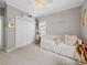 Bright bedroom features two windows, a daybed, and a large closet at 1021 Mallard Landing Dr, Monroe, NC 28110