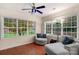 Bedroom with hardwood floors, lots of natural light from two windows and chair rail details at 10418 Goosefoot Nw Ct, Concord, NC 28027
