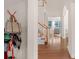 Inviting foyer with hardwood floors, a grand staircase, and views into the adjacent living spaces at 10418 Goosefoot Nw Ct, Concord, NC 28027