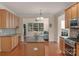 Open kitchen with a view of the living room and lots of cabinet space and a center island at 10418 Goosefoot Nw Ct, Concord, NC 28027