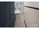 Classic bathroom with black and white tiled floor and white fixtures at 1101 Pee Dee Ave, Albemarle, NC 28001