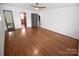 Spacious bedroom with hardwood floors and multiple doorways at 1101 Pee Dee Ave, Albemarle, NC 28001