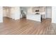 Open kitchen and living area, showcasing stainless appliances and a kitchen island with seating at 11019 Daisy Ct, Charlotte, NC 28262