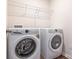 Laundry room featuring a modern washer and dryer at 11019 Daisy Ct, Charlotte, NC 28262