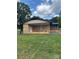 Brick home featuring a charming covered porch and well-maintained lawn at 1120 Mcintyre Rd, Wingate, NC 28174