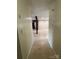 Hallway featuring tile flooring leading to the living room at 1120 Mcintyre Rd, Wingate, NC 28174