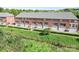 Aerial view of townhomes showing their layout and green surroundings at 119 Steinbeck Way # E, Mooresville, NC 28117
