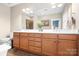 Spacious bathroom with double sink vanity, tile floor, and separate shower at 119 Steinbeck Way # E, Mooresville, NC 28117