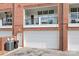 Townhome garage and balcony with blue patio furniture at 119 Steinbeck Way # E, Mooresville, NC 28117