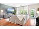 Comfortable living room with hardwood floors and a large window offering plenty of light at 119 Steinbeck Way # E, Mooresville, NC 28117