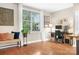 Cozy living area with hardwood floors, natural light, and space for a home office at 119 Steinbeck Way # E, Mooresville, NC 28117