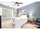 Serene bedroom with soft carpet, a large window, and a calming color scheme at 119 Steinbeck Way # E, Mooresville, NC 28117