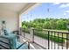 Relaxing outdoor patio with comfortable seating and a beautiful nature view at 119 Steinbeck Way # E, Mooresville, NC 28117
