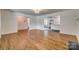 Inviting living room with hardwood floors offering seamless access to kitchen at 1423 Ebinport Rd, Rock Hill, SC 29732