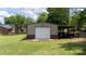 A well-kept detached garage with a white door provides secure parking and storage at 1423 N New Hope Rd, Gastonia, NC 28054