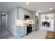 Well-lit kitchen featuring stainless steel appliances and modern cabinetry at 1423 N New Hope Rd, Gastonia, NC 28054