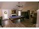 Entertain in this billiards room with fireplace, outside access, and adjacent to kitchen at 14406 Gadwall Ct, Charlotte, NC 28273