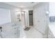 Main bathroom featuring soaking tub with shower, and built-in storage at 14406 Gadwall Ct, Charlotte, NC 28273