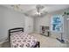 Cozy bedroom with bright light, carpet, and a charming play kitchen at 1506 Ivy Bluff Way, Matthews, NC 28105