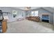 This bonus room offers ample space for entertaining and activities with a sofa and table at 1506 Ivy Bluff Way, Matthews, NC 28105