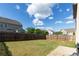 Large backyard with a well-maintained lawn and wooden fence at 159 Saye Pl, Mooresville, NC 28115