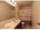 Well lit bathroom featuring double vanity sinks and shower/tub combo at 159 Saye Pl, Mooresville, NC 28115