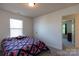 Bedroom with carpet, window, and neutral paint at 159 Saye Pl, Mooresville, NC 28115