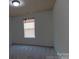 This is a bright bedroom that has a window that allows light to flow into the room at 159 Saye Pl, Mooresville, NC 28115