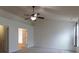 Spacious bedroom with a ceiling fan and two doors, allowing access to other rooms at 159 Saye Pl, Mooresville, NC 28115