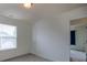 Bedroom with carpet, window with blinds, and doorway to other room at 159 Saye Pl, Mooresville, NC 28115