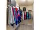 Walk-in closet with ample hanging space and built-in shelving for organization at 159 Saye Pl, Mooresville, NC 28115