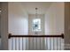 Hallway with decorative lighting fixture at 159 Saye Pl, Mooresville, NC 28115