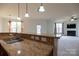 The kitchen has an open layout to the dining and living area at 159 Saye Pl, Mooresville, NC 28115