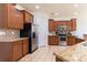 Modern kitchen with stainless steel appliances, granite countertops, and ample cabinet space at 159 Saye Pl, Mooresville, NC 28115