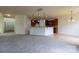 Open floor plan living room showcases neutral colors, modern lighting, and transitions to the kitchen area at 159 Saye Pl, Mooresville, NC 28115