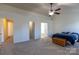 Spacious main bedroom with neutral paint, carpet, ceiling fan, and plenty of natural light at 159 Saye Pl, Mooresville, NC 28115