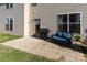 Back patio features a grill, outdoor furniture, and manicured lawn at 159 Saye Pl, Mooresville, NC 28115