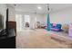 Basement with multiple play areas and ample room for entertaining at 16114 Foreleigh Rd, Huntersville, NC 28078