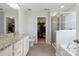 Elegant main bathroom featuring double sinks, granite countertops, a soaking tub, and a separate shower at 16114 Foreleigh Rd, Huntersville, NC 28078