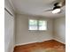 Bedroom with hardwood flooring and a closet at 2001 Tyvola Rd, Charlotte, NC 28210