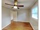 Bedroom featuring hardwood flooring, a ceiling fan, and natural light at 2001 Tyvola Rd, Charlotte, NC 28210
